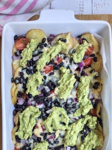 Top view of potato nachos in dish